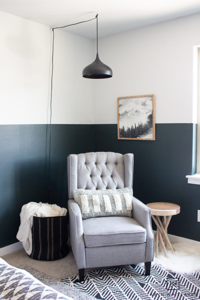 Take a tour of this cozy reading corner in this green, black and white boys room! I love the modern lodge look in here with industrial touches. 