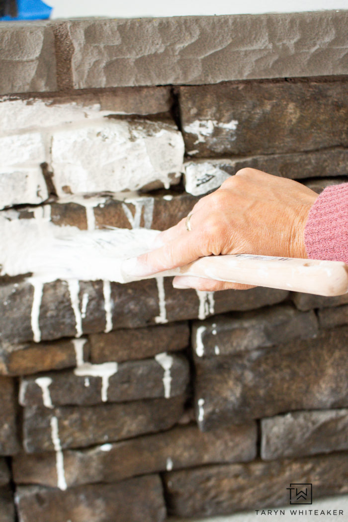 Get the look of this White Wash Stone Fireplace with an easy DIY makeover! You can get this farmhouse style look for just $6!