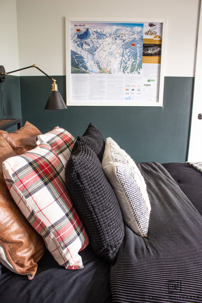 Take a tour of this Modern Lodge Bedroom with color blocked walls, wood accent wall and cozy kid's reading corner. 