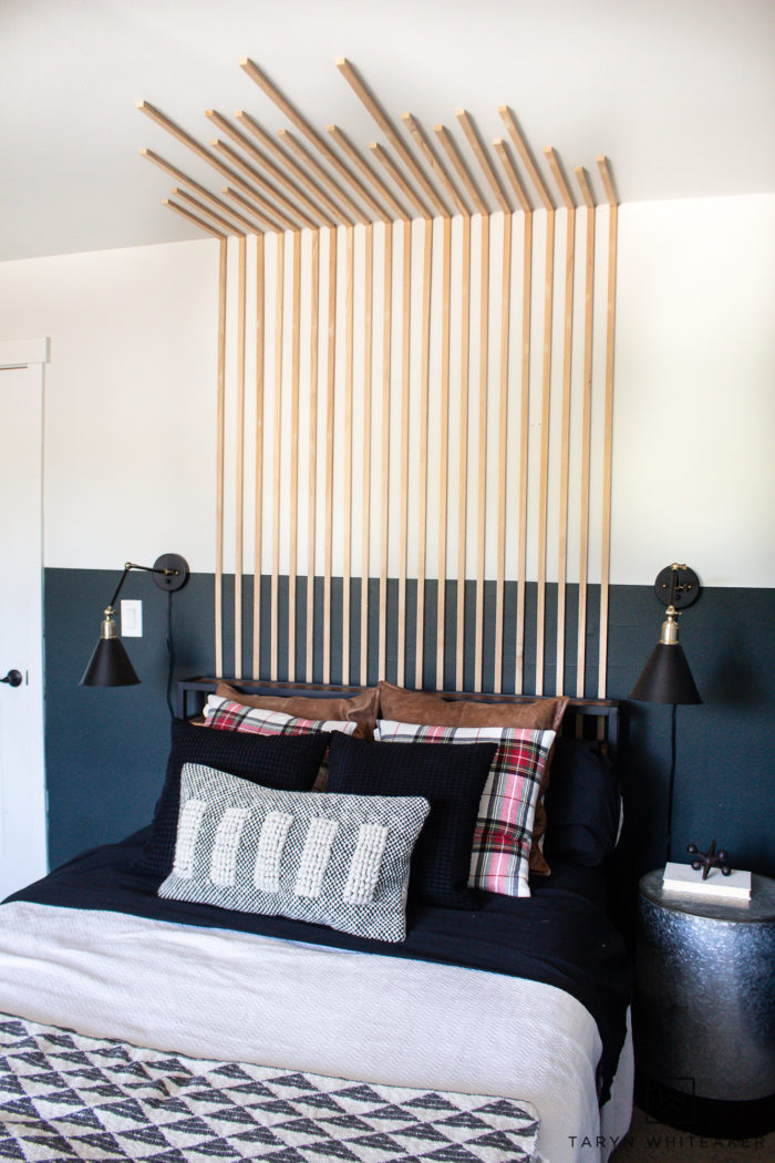 Add dimension to your bedroom with this Vertical Slat Wall that also works as a DIY headboard! Easy bedroom DIY. 