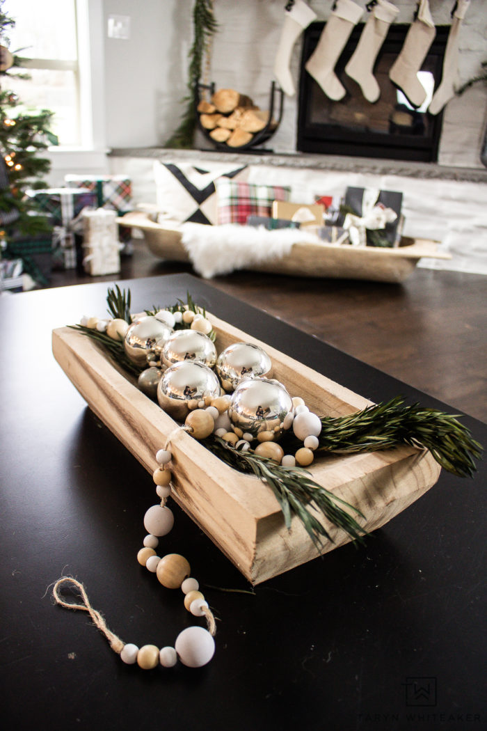 Take a tour of this design blogger home using tons of Neutral Christmas Decor that still feels festive! From black and white Christmas decor and lots of greenery. 