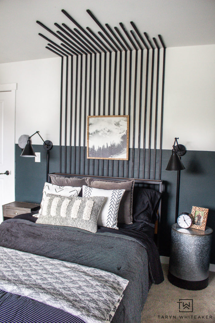 Black, white and green boys room with modern mountain decor. 