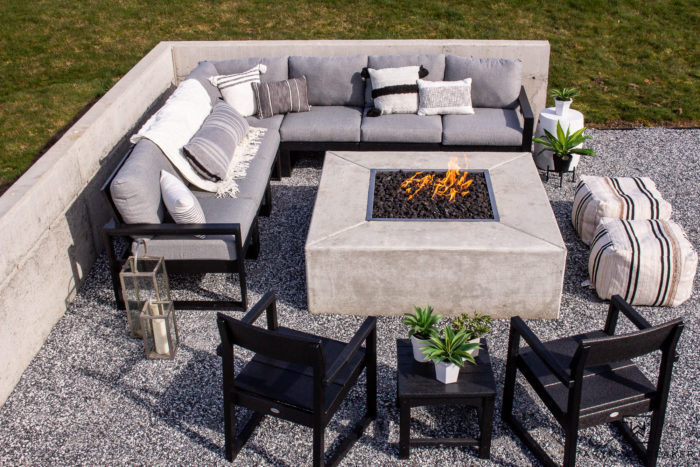 Tour this modern outdoor fire pit seating area with gorgeous Polywood outdoor furniture and neutral tones. 