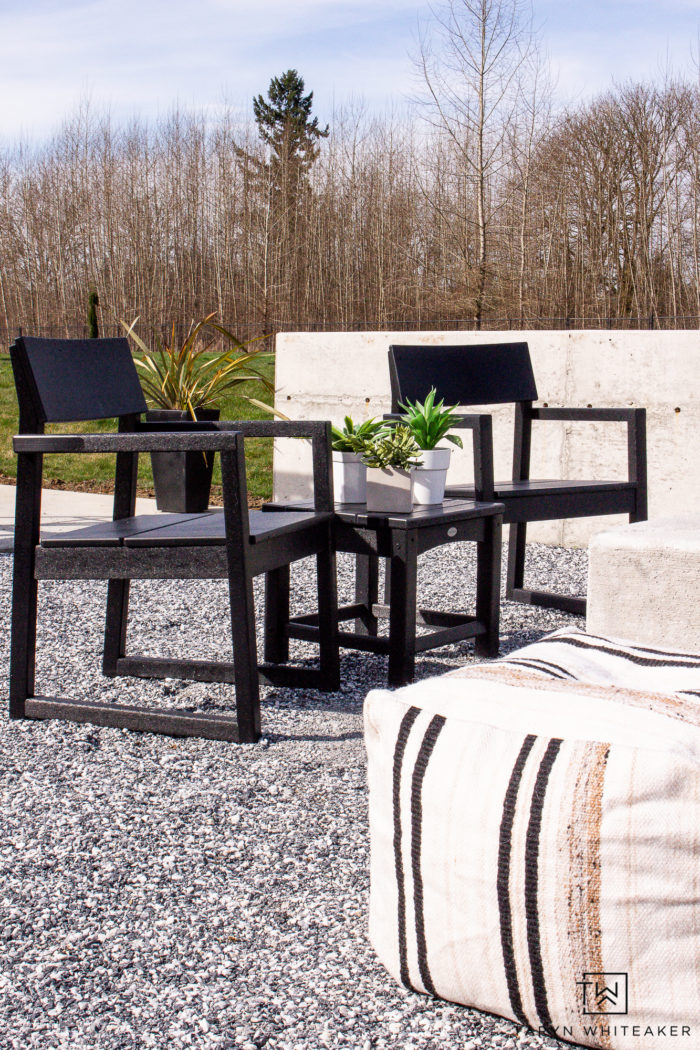 Tour this modern outdoor fire pit seating area with gorgeous Polywood outdoor furniture and neutral tones. 