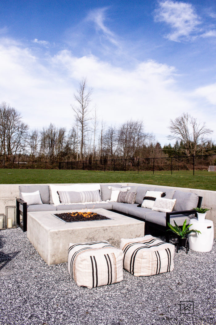 Tour this modern outdoor fire pit seating area with gorgeous Polywood outdoor furniture and neutral tones. 