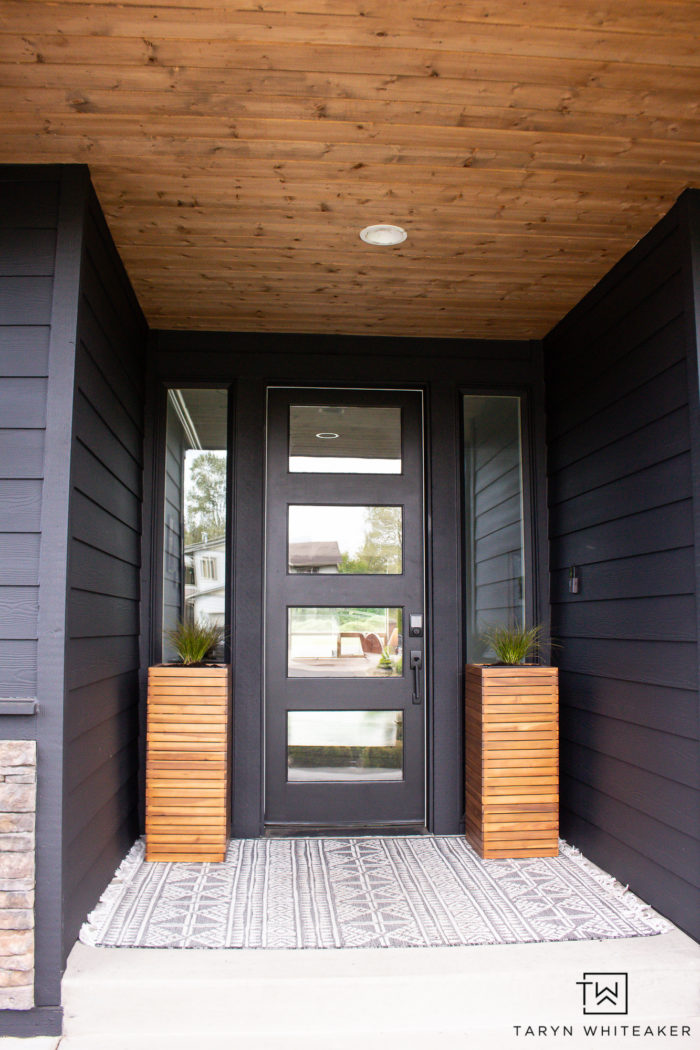 Sherwin Williams Tricorn Black exterior paint on modern spring porch. 