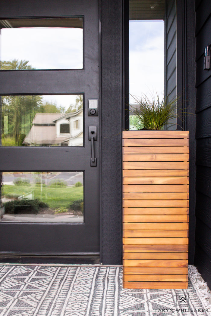 Modern wood planters on spring porch. 