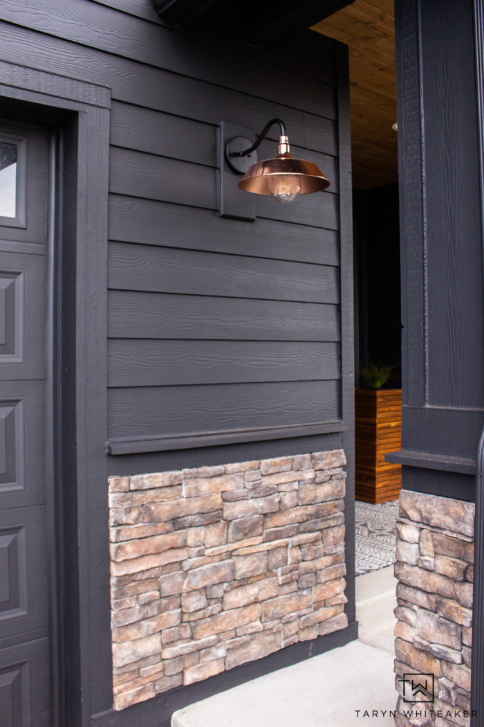 Sherwin Williams Tricorn Black exterior paint on modern spring porch. 