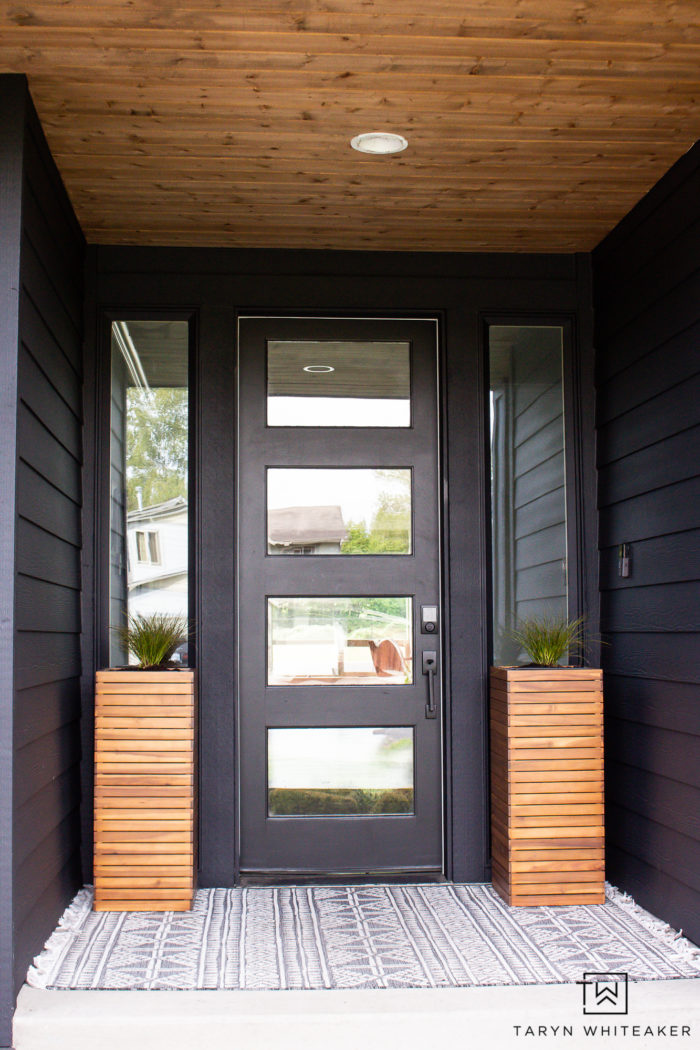 Sherwin Williams Tricorn Black exterior paint on modern spring porch. 