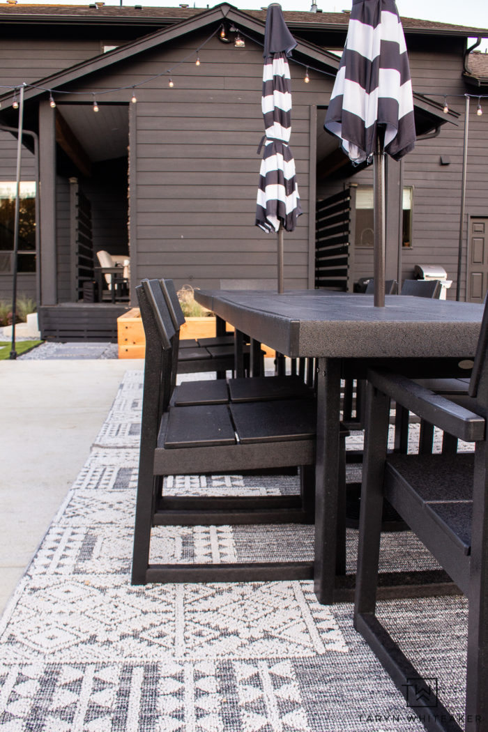 Modern Outdoor Dining Space using two Polywood EDGE Dining Tables to create a large 12 person outdoor dining table. 