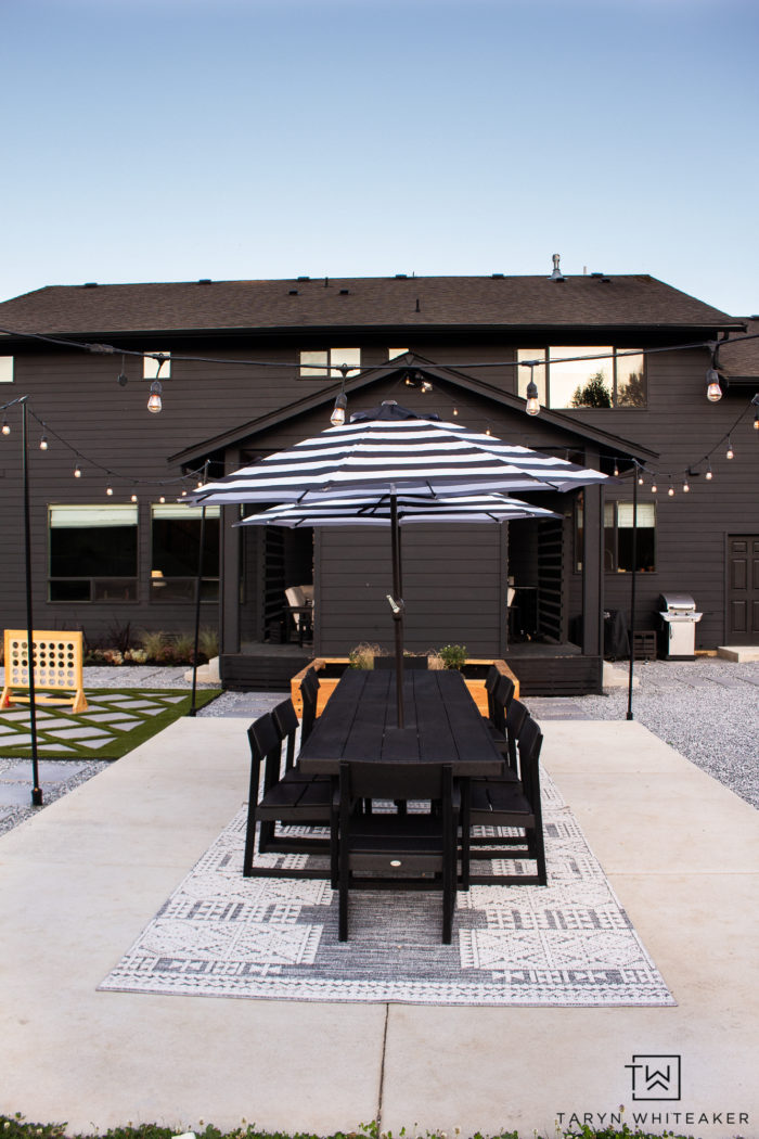 Modern Outdoor Dining Space using two Polywood EDGE Dining Tables to create a large 12 person outdoor dining table. 