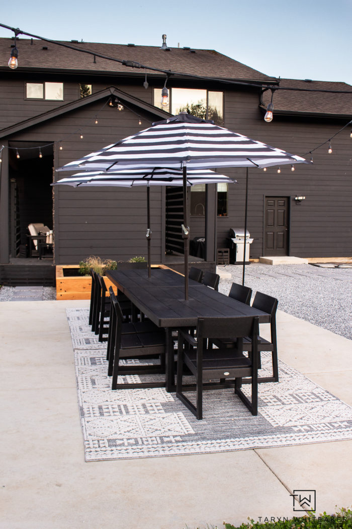 Modern Outdoor Dining Space using two Polywood EDGE Dining Tables to create a large 12 person outdoor dining table. 