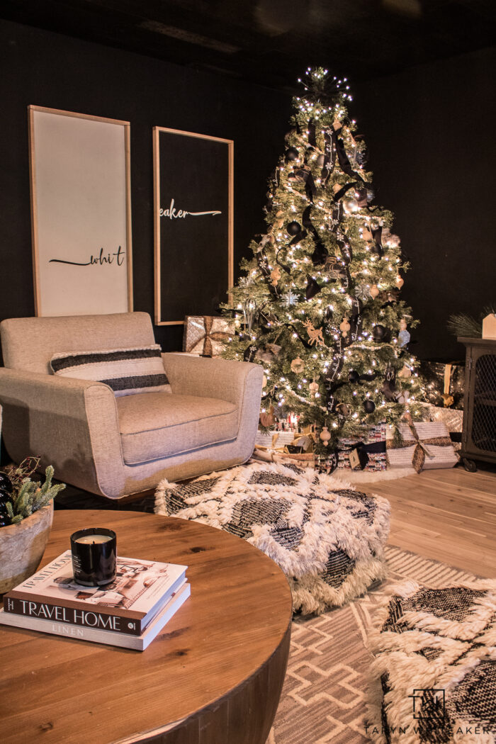 Tour this Moody Christmas Tree Decor styled in a cozy movie room. The black and white Christmas Tree is both modern and woodsy. 