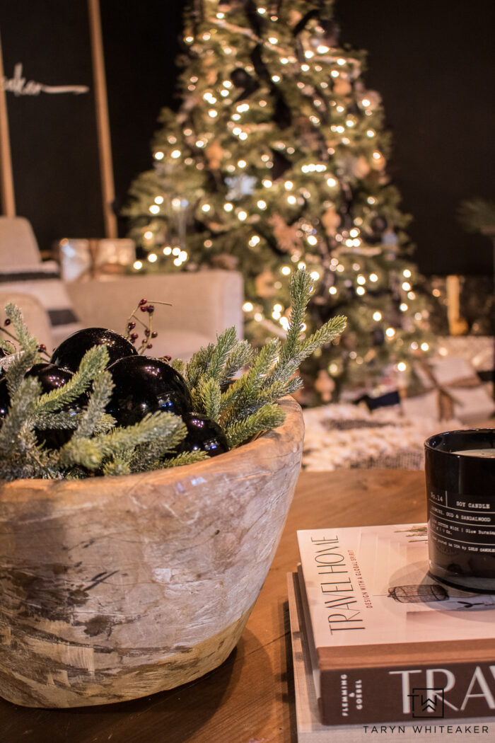 Ornaments styled in a bowl with greenery