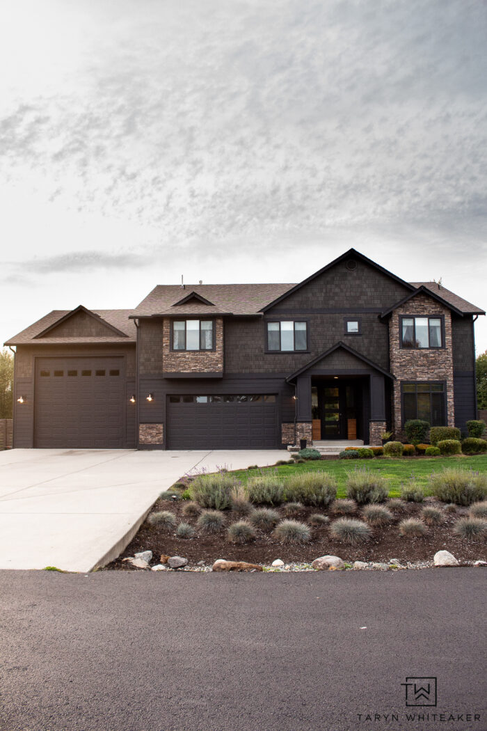 Dark Home Exterior Makeover using Tricorn Black and black alder stain