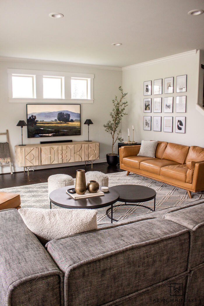 Mid Century Modern Living Room Design with Cognac leather sofas and neutral touches. 