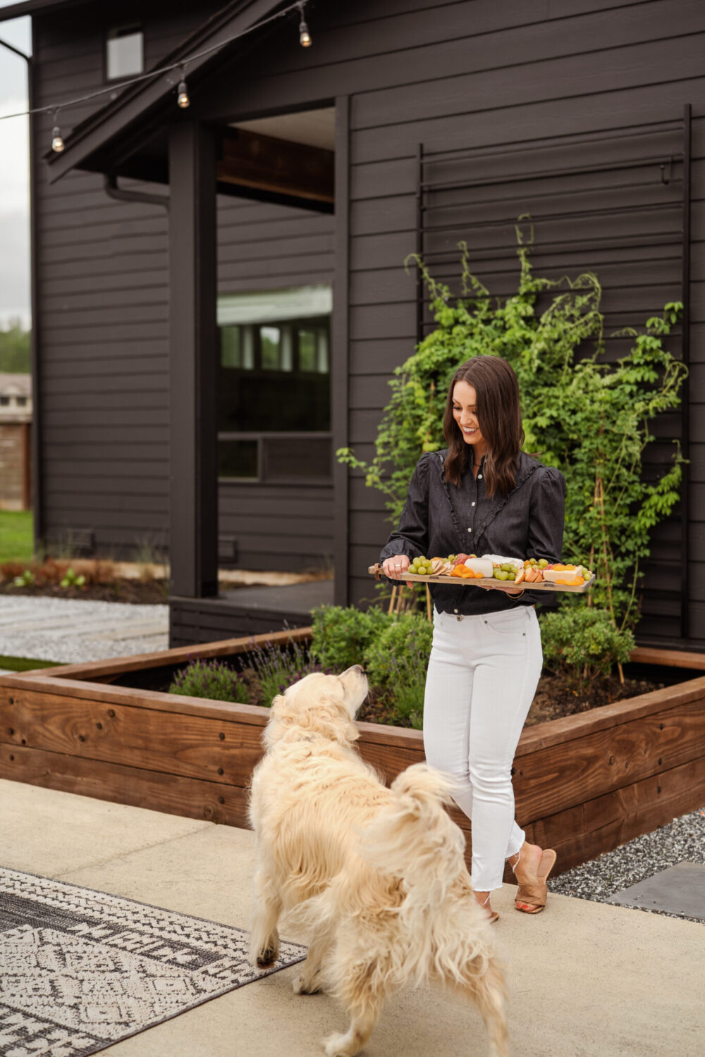 SW Tricorn Black Exterior with warm wood accents 