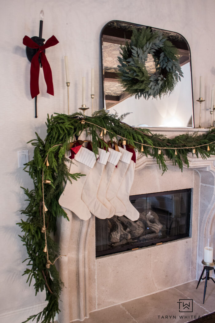 Transitional Christmas Decor style over a limestone fireplace and traditional decor elements. 