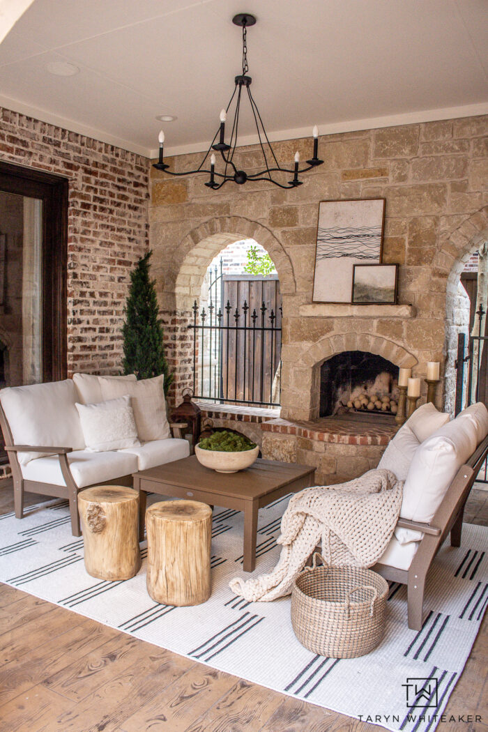 Tour this Modern European Outdoor Fireplace Seating Area. Keeping the traditional brick and stone and adding more modern, transitional decor.