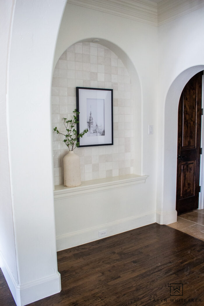 Tiled Arched Wall Niche! Learn how to update your space with a transitional modern look using ceramic tile and neutral decor accents. 