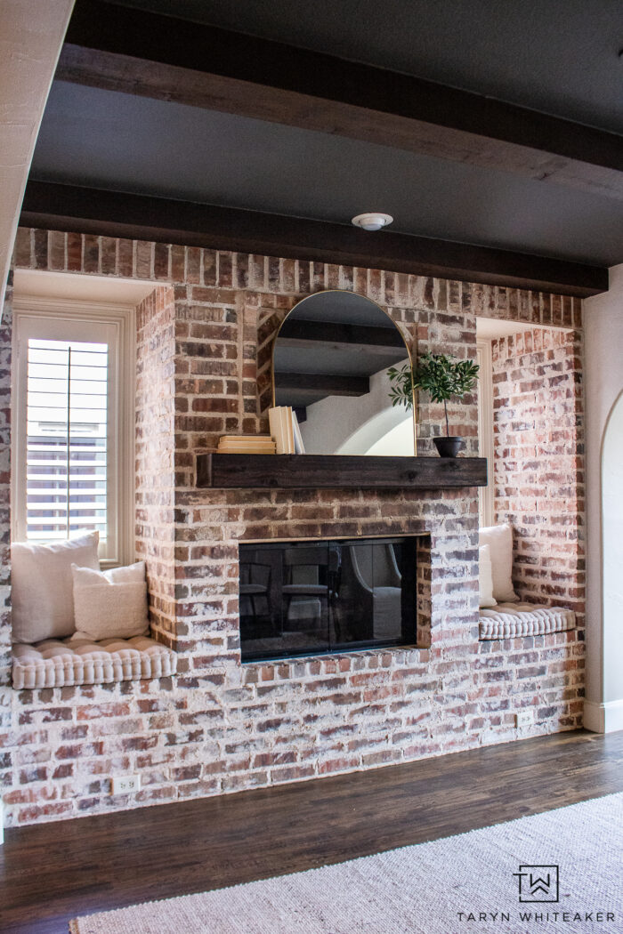 See the before and after of this Modern English Brick Fireplace decorated with soft neutrals and urbane bronze ceiling for a modern look.