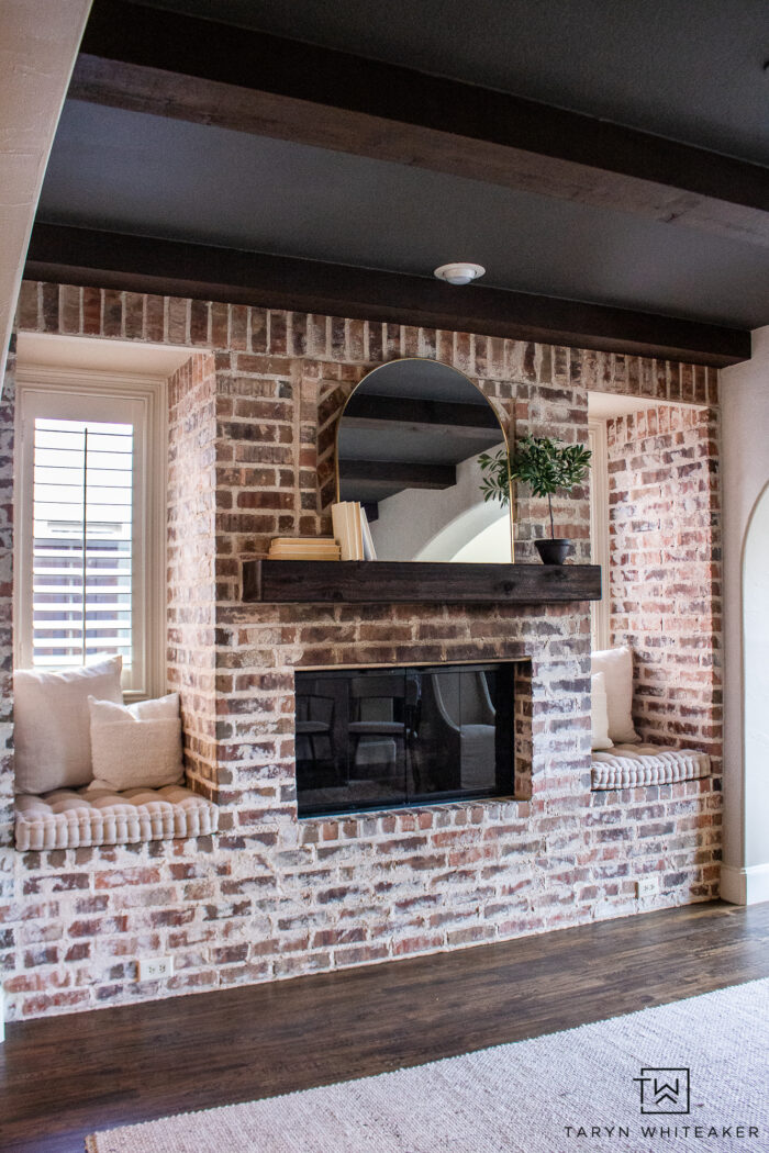 modern living room with brick fireplace