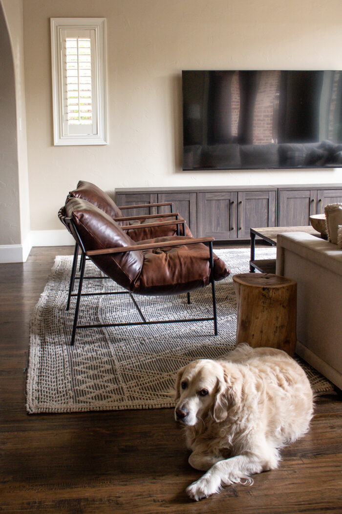 Organic modern family room design with casual elegance. Deep rich browns and neutral colors and texture.