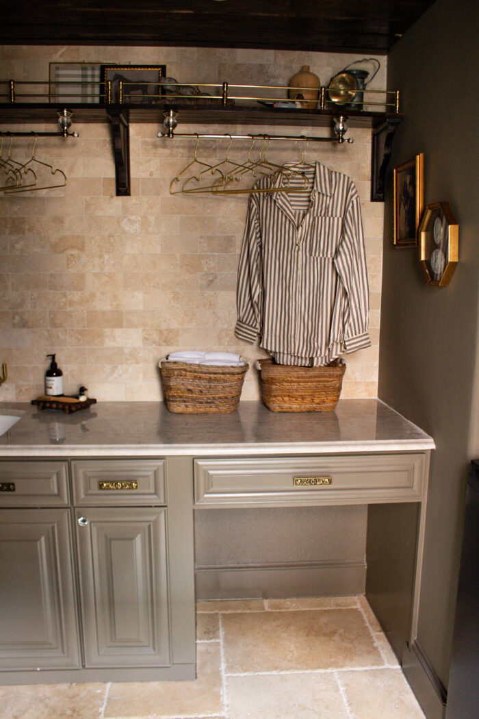 Moody vintage laundry room makeover using BM Cromwall Gray color drench with antique and gold accents. 
