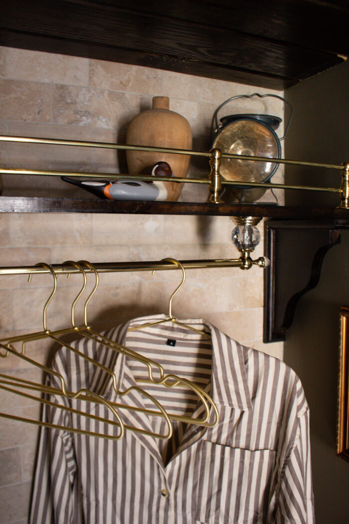 Moody vintage laundry room makeover using BM Cromwall Gray color drench with antique and gold accents. 